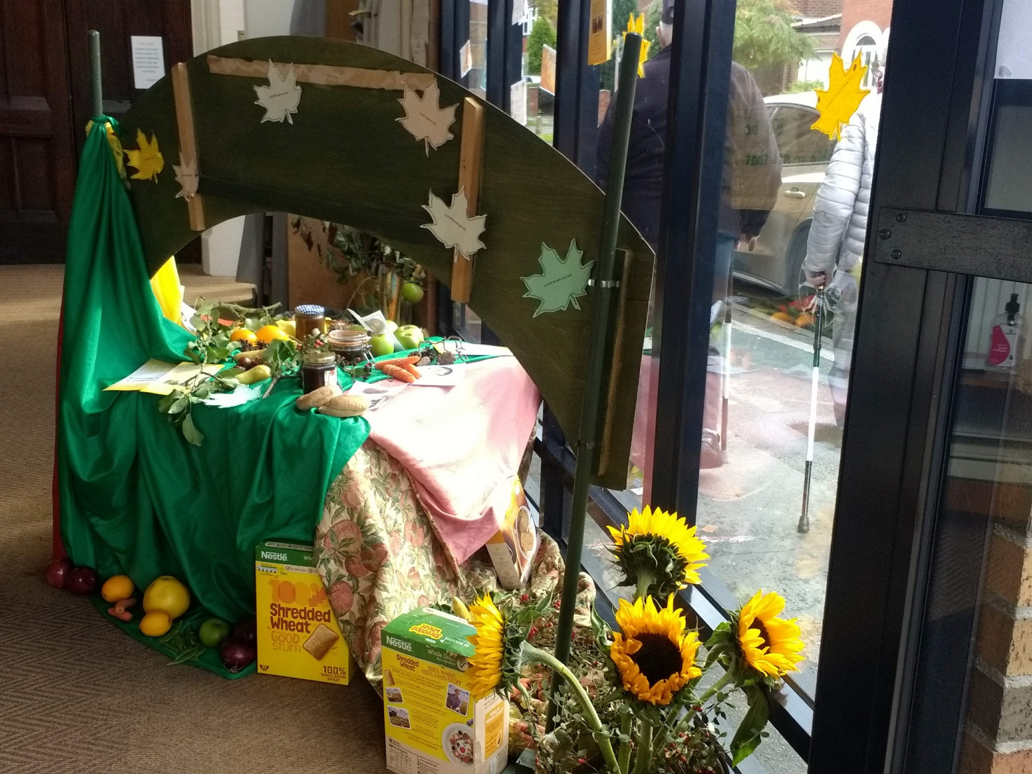 Window display with Noah's ark and large rainbow